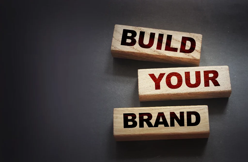 Build Your Brand carved into wood